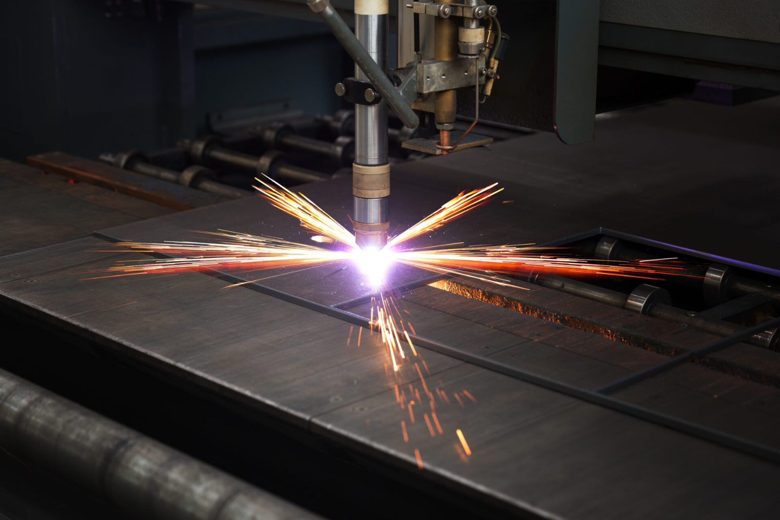 Plasma cutting steel plate on the shop floor