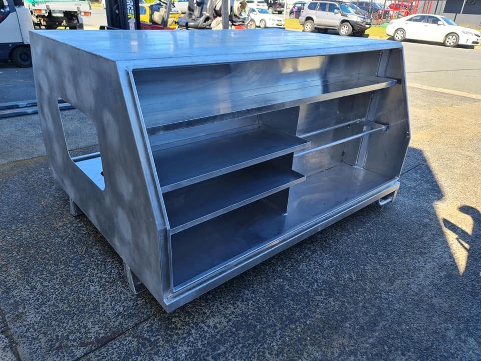 A bare aluminium canopy shell mid-build outside the BWC workshop