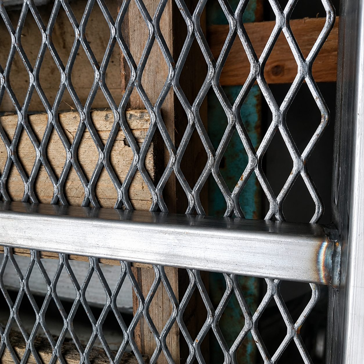 An expanded mesh panel welded into a steel frame