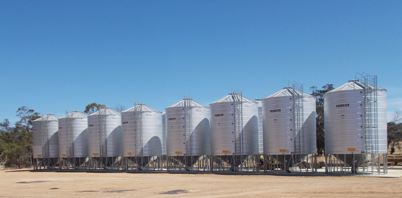 Pederick-built grain silos standing in a Western Australian paddock
