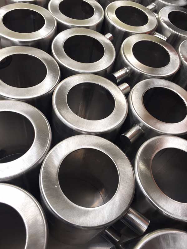 A batch of machined stainless components