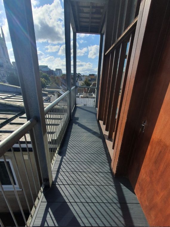 Steel-framed balcony decking overlooking the town