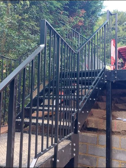 External steel staircase and balustrade, mid-installation
